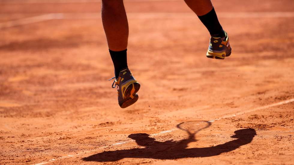 Spain's Roberto Carballes Baena in action against Greece´s Stefanos Tsitsipas during the quarterfinal match of the  Estoril Open Tennis tournament in Cascais, near Lisbon, Portugal, 04 May 2018. JOSE SENA GOULAO/LUSA