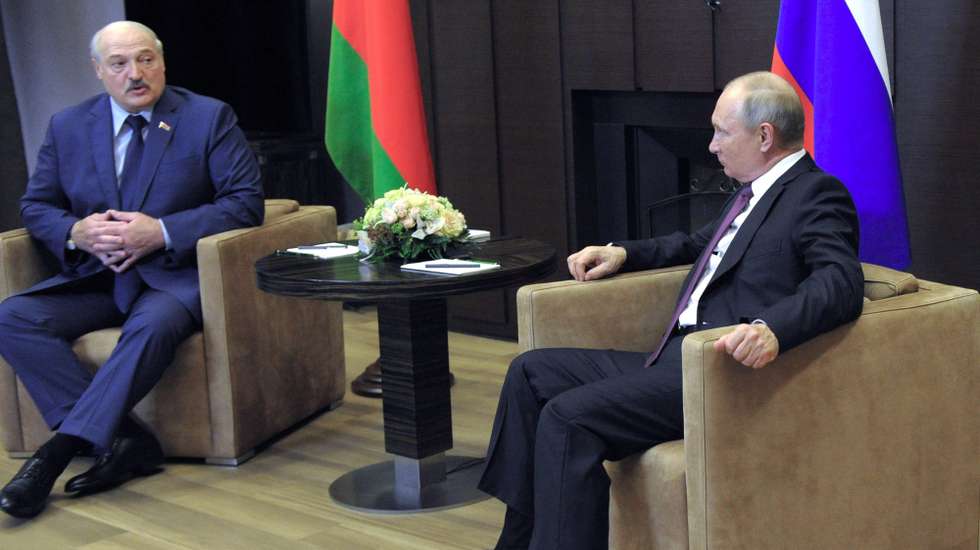 epa09233577 Russian President Vladimir Putin (R) speaks with Belarusian President Alexander Lukashenko (L) during their meeting in Sochi, Russia, 28 May 2021. This is the third meeting in a year between Alexander Lukashenko and Vladimir Putin, but the first after the aggravation of relations between Belarus and the EU due to the situation with the Ryanair flight.  EPA/MIKHAEL KLIMENTYEV/SPUTNIK/KREMLIN POOL
