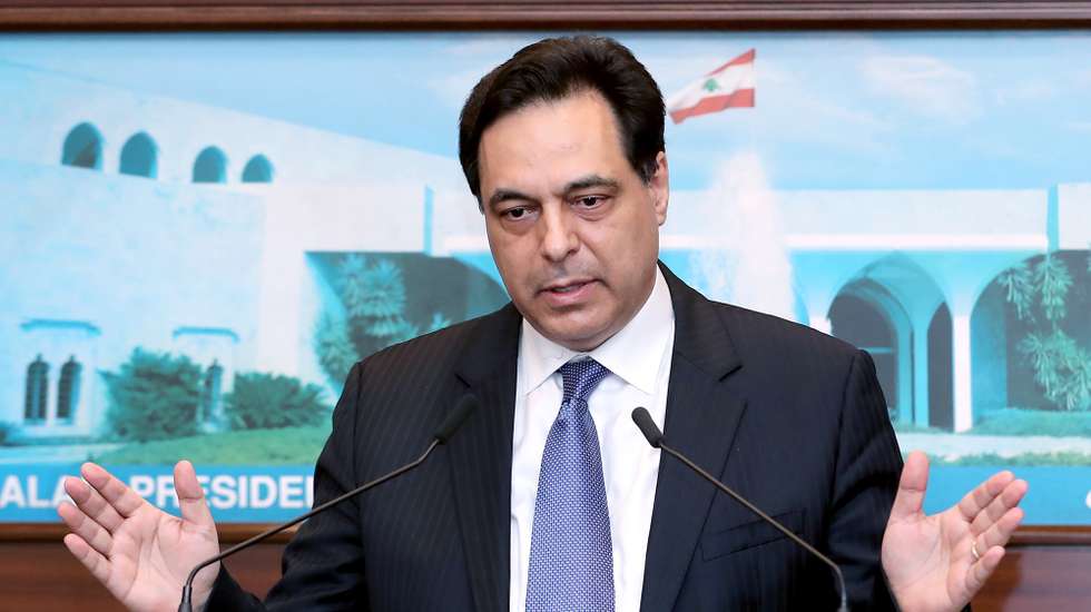 epa08811341 A handout photo made available by Official Photography of the Lebanese Government Dalati Nohra shows, Lebanese Caretaker Prime Minister, Hassan Diab, speaks to media after the meeting of the Supreme Council headed by the President of the Republic General Michel Aoun, and the presence of the relevant ministers and leaders of the security services at the Presidential Palace in Baabda, east Beirut, Lebanon, November 10, 2020. Announced a decision to put the country under full lockdown starting Saturday, November 14, until Sunday, November 30. And he highlighted the obligation to abide by the confinement measures in order to contain the pandemic and save lives. Exempted from the closure are Beirut International Airport, the land and sea borders, supermarkets, bakeries, pharmacies, and government institutions that provide services to citizens, doctors and the press.  EPA/DALATI NOHRA HANDOUT  HANDOUT EDITORIAL USE ONLY/NO SALES