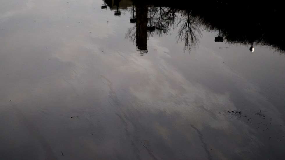 epa05823815 Polluted water is seen in a creek under the Bruckner Expressway in the Bronx, New York, USA, 01 March 2017. The Trump administration is proposing numerous changes through executive orders to the United States' environmental laws because the administration sees the regulations as curbing economic growth.  EPA/JUSTIN LANE