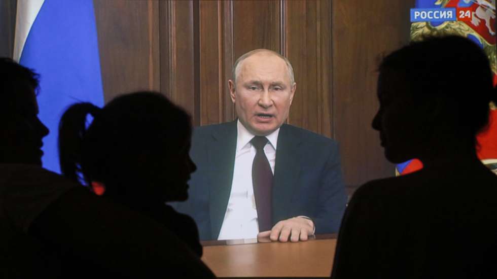 epa09776103 A Russian family watches a Russian President Vladimir Putin  address to the Nation on what is happening in the Donbas and on the border with Ukraine in Moscow, Russia, 21 February 2022. The heads of the self-proclaimed Donetsk People's Republic (DPR) and the Luhansk People's Republic (LPR) asked the President of Russia to recognize the self-proclaimed republics. This issue was discussed at a meeting of the Security Council of the Russian Federation, Vladimir Putin appealed to the Federal Assembly of the Russian Federation to ratify the treaty of friendship and mutual assistance with the DPR-LPR. Putin  signed decrees on the recognition of the self-proclaimed Donetsk People's Republic (DPR) and the Luhansk People's Republic (LPR).  EPA/SERGEI ILNITSKY