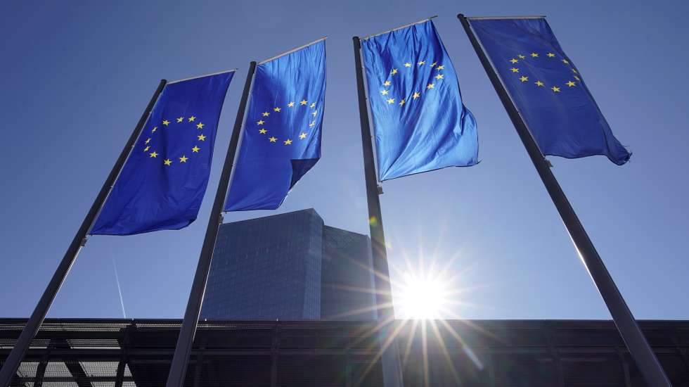 epa09814349 A view of flags in front of the European Central Bank (ECB) in Frankfurt am Main, Germany, 10 March 2022. The ECB Governing Council will hold a monetary policy meeting on 10 March.  EPA/RONALD WITTEK