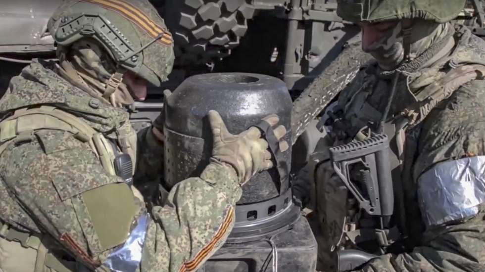 epa09829125 A handout still image taken from handout video made available by the Russian Defence ministry press-service shows Russian soldiers examine US anti-tank missile that was abandoned by Ukrainian army during their retreat in Donetsk region, Ukraine, 16 March 2022. On 24 February Russian troops had entered Ukrainian territory in what the Russian president declared a 'special military operation', resulting in fighting and destruction in the country, a huge flow of refugees, and multiple sanctions against Russia.  EPA/RUSSIAN DEFENCE MINISTRY PRESS SERVICE / HANDOUT  HANDOUT EDITORIAL USE ONLY/NO SALES