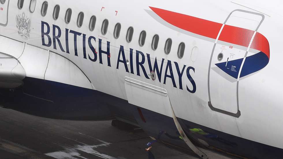 epa08749894 (FILE) - Ground personnel closes a cargo door of a British Airways aircraft standing on a parking position at Heathrow Airport in London, Britain, 29 May 2017 (reissued 16 October 2020). Britain's flagship aircraft carrier British Airways was on 16 October 2020 fined by the British Information Commissioner's Office, IOC, 20 million pound for 'failing to protect the personal and financial details of more than 400,000 of its customers', and processing 'personal data without adequate security measures in place' as the authority stated.  EPA/ANDY RAIN *** Local Caption *** 56053393