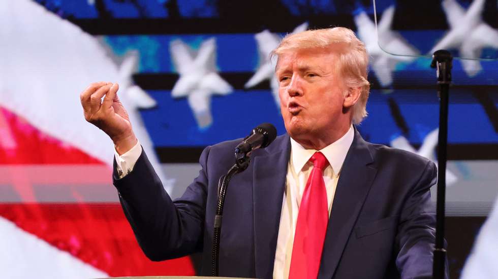 epa09947808 Former US President Donald Trump speaks during the American Freedom Tour at the Austin Convention Center in Austin, Texas, USA, 14 May 2022. The American Freedom Tour is a gathering of conservatives to celebrate Faith, Family, Finances, and Freedom.  EPA/ADAM DAVIS