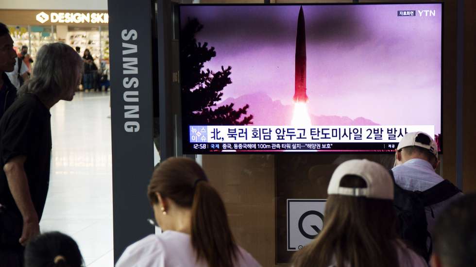 epa10857848 People watch a news segment on North Korea, at a station in Seoul, South Korea, 13 September 2023. According to South Korea's Joint Chiefs of Staff (JCS), North Korea launched two ballistic missiles toward the East Sea amid North Korean leader Kim Jong-un's visit to Russsia.  EPA/JEON HEON-KYUN