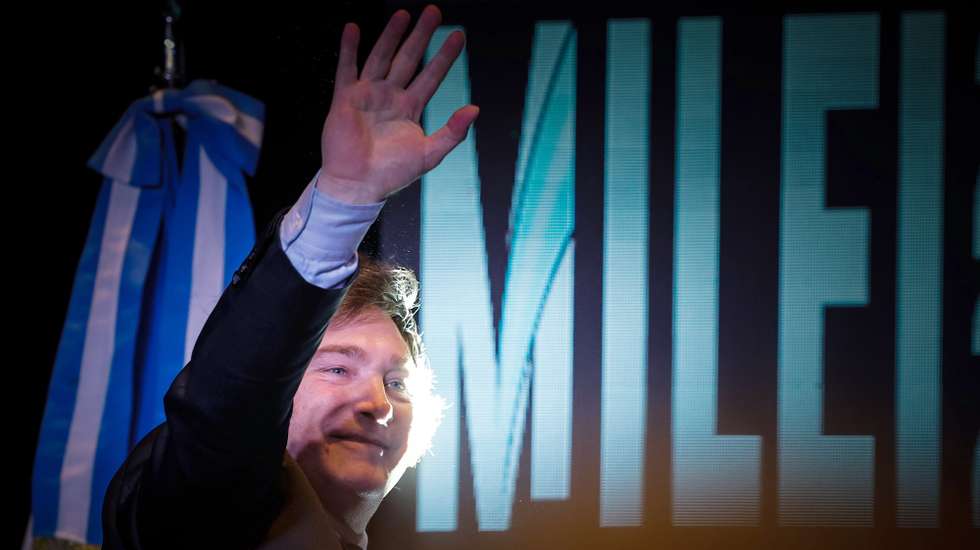 epa10985546 Argentine president-elect Javier Milei greets supporters prior to his speech following his win in the runoff election, in Buenos Aires, Argentina, 19 November 2023. Milei, candidate for far-right party La Libertad Avanza, defeated the ruling party's candidate Sergio Massa and will be the next president of Argentina effective December 10.  EPA/Juan Ignacio Roncoroni