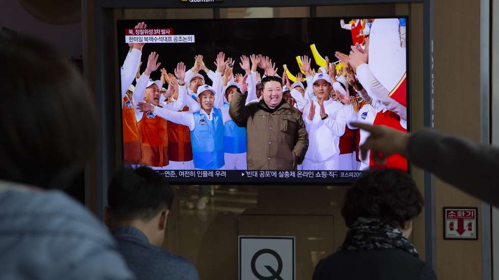epa10988717 People watch the news at a station in Seoul, South Korea, 22 November 2023. According to South Korea's Joint Chiefs of Staff (JCS), North Korea launched a new-type carrier rocket 'Chollima-1' with the reconnaissance satellite 'Malligyong-1' from Sohae Satellite Launching Ground in Cholsan County, on 21 November 2023. According to KCNA, North Korea's National Aerospace Technology Administration (NATA) successfully launched 'Chollima-1' and 'accurately put the reconnaissance satellite 'Malligyong-1' on its orbit at 22:54:13, 705s after the launch'.  EPA/JEON HEON-KYUN