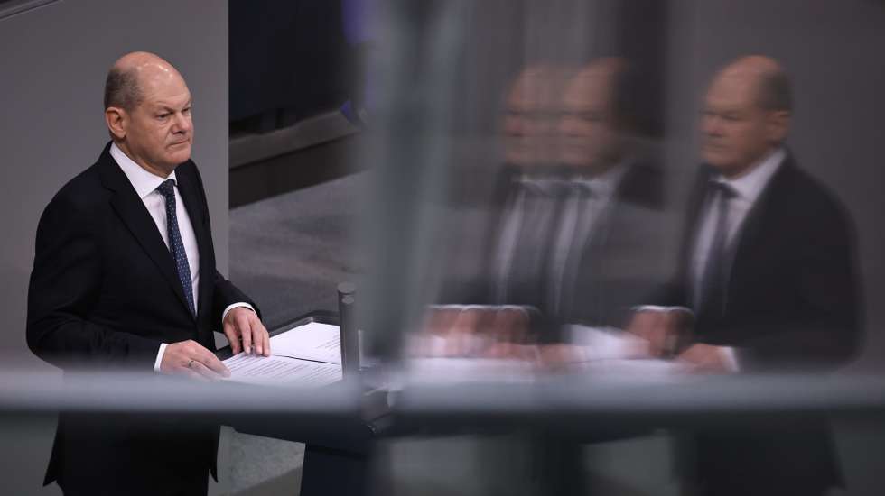 epa10998724 German Chancellor Olaf Scholz looks on as he delivers a government statement at the German parliament 'Bundestag' in Berlin, Germany, 28 November 2023. Olaf Scholz addressed the parliamentarians with a government statement on the government's budget crisis, following a German Constitutional Court's verdict, criticizing the government of relocating 60 billion Euro from covid funds into the combat of climate change.  EPA/CLEMENS BILAN