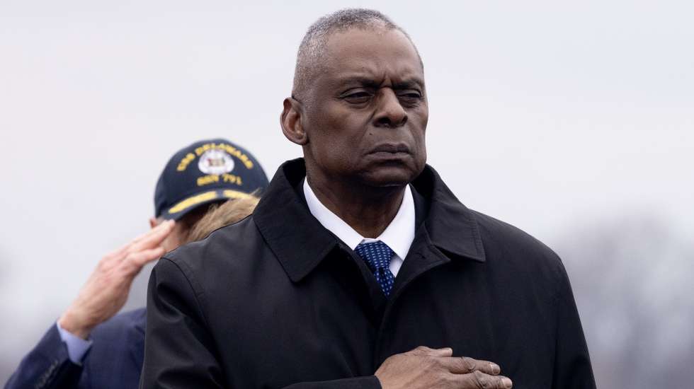 epa11121831 US Secretary of Defense Lloyd Austin watches a US Army carry team move a flag-draped transfer case containing the remains of a fallen US service member during a dignified transfer at Dover Air Force Base in Dover, Delaware, USA, 02 February 2024. US Army Sergeant Jerome Rivers. US Army Sergeant Breonna Moffett, and US Army Sergeant Kennedy Sanders died in a drone strike on 28 January at a military base in Jordan; forty other US troops were also injured in the attack. The enemy drone, which the White House has blamed on an Iran-backed militia, may have been mistaken for a US drone and left unimpeded, according to a preliminary report.  EPA/MICHAEL REYNOLDS