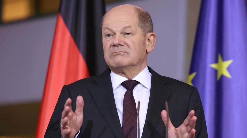 epa11148258 German Chancellor Olaf Scholz gestures next to Polish Prime Minister Donald Tusk (not in the picture) during a joint press conference at the chancellery in Berlin, Germany, 12 February 2024. German Chancellor Olaf Scholz and Polish Prime Minister Donald Tusk met for bilateral talks.  EPA/CLEMENS BILAN