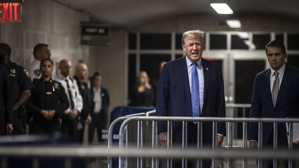 epa11303909 Former US President Donald Trump speaks to reporters alongside his attorney Todd Blanche (R) at the end of week two of his hush money trial at Manhattan criminal court in New York, USA, 26 April 2024. Trump faces 34 felony counts of falsifying business records as part of an alleged scheme to silence claims of extramarital sexual encounters during his 2016 presidential campaign.  EPA/Dave Sanders / POOL