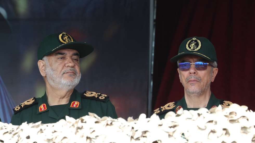 epa11283753 Islamic Revolutionary Guard Corps military commander General Mohammad Bagheri (R) and head of Iranian revolutionary guard corps (IRGC) Hossein Salami (L) attend the Army Day in a military base in Tehran, Iran, 17 April 2024. According to Iranian state media, Raisi described the recent attack launched towards Israel as 'limited' and 'punitive', adding that any act of aggression against Iran will be dealt with a 'powerful and fierce' response. Iran's Islamic Revolutionary Guards Corps (IRGC) launched drones and rockets towards Israel late on 13 April.  EPA/ABEDIN TAHERKENAREH