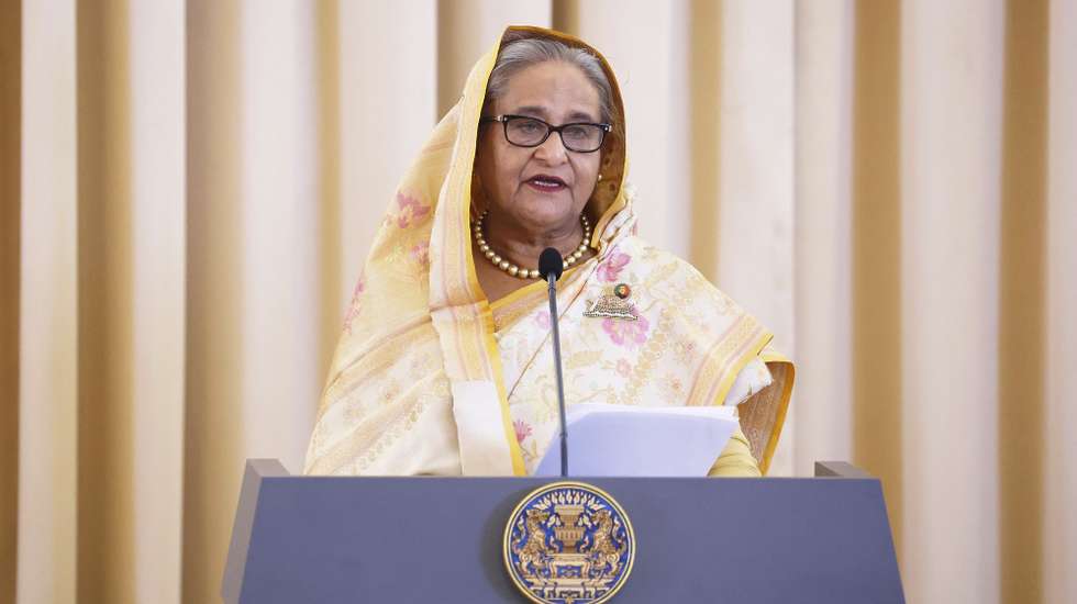 epa11526981 (FILE) Bangladesh Prime Minister Sheikh Hasina delivers a joint statement at the Government House in Bangkok, Thailand, 26 April 2024 (reissued 05 August 2024). Dhaka authorities have imposed a new curfew starting 06:00 p.m. local time on 04 August. As casualties mounted and law enforcement struggled to contain the unrest, the Bangladeshi government on 20 July 2024 had imposed an initial nationwide curfew and deployed military forces after violence broke out in Dhaka and other regions following student-led protests demanding reforms to the government's job quota system.  EPA/NARONG SANGNAK