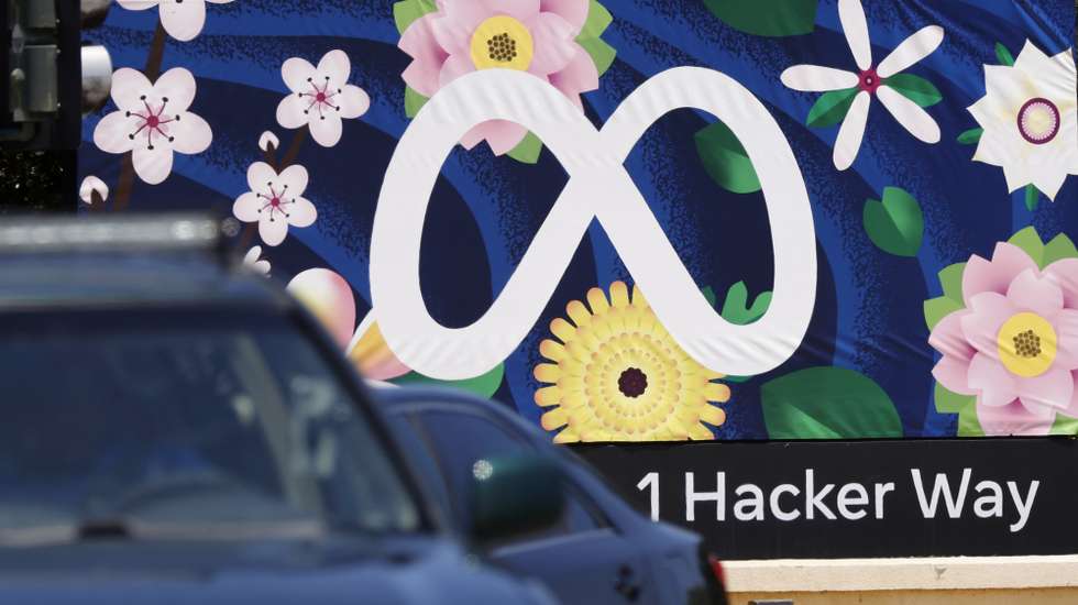 epa10646661 Cars drive past the Meta logo in front of the Meta headquarters in Menlo Park, California, USA, 22 May 2023. Meta has been hit with a 1.2 billion euro fine for sending millions of privacy data from Europeans to the United States.  EPA/JOHN G. MABANGLO