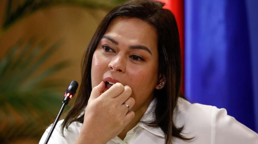 epa11665914 Philippines Vice-President Sara Duterte reacts during a press conference at her office in Mandaluyong City, Metro Manila, Philippines, 18 October 2024. Duterte criticized Philippines President Ferdinand Marcos Jr. and accused him of being unfit for the job of the president.  EPA/ROLEX DELA PENA