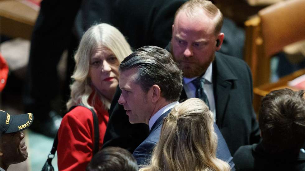 epa11842650 Pete Hegseth (C), President Trump's nominee for Secretary of Defense with members of the audience during the National Prayer Service at the Washington National Cathedral in Washington, DC, USA, 21 January 2025. President Trump was inaugurated on 20 January in a ceremony at the US Capitol.  EPA/WILL OLIVER