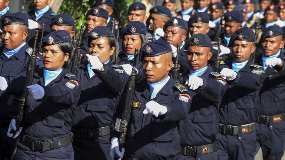 epa10544992 East Timor's national police officers march during a ceremony to mark the 23rd anniversary of National Police Force or Policia Nacional de Timor-Leste (PNTL) in Dili, East Timor, also known as Timor Leste, 27 March 2023. The PNTL was formed under the United Nation before handed over to the Timor-Leste government to provide security and maintain law and order in the country.  EPA/ANTONIO DASIPARU