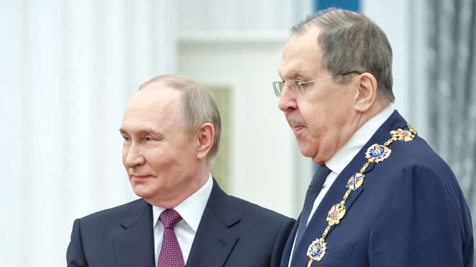 epa12125806 Russian President Vladimir Putin (L) awards Foreign Minister Sergey Lavrov with the Order of St. Andrew the Apostle the First-Called during a ceremony at the Kremlin Senate Palace in Moscow, Russia, 22 May 2025.  EPA/ALEXANDER KAZAKOV / SPUTNIK / KREMLIN POOL MANDATORY CREDIT