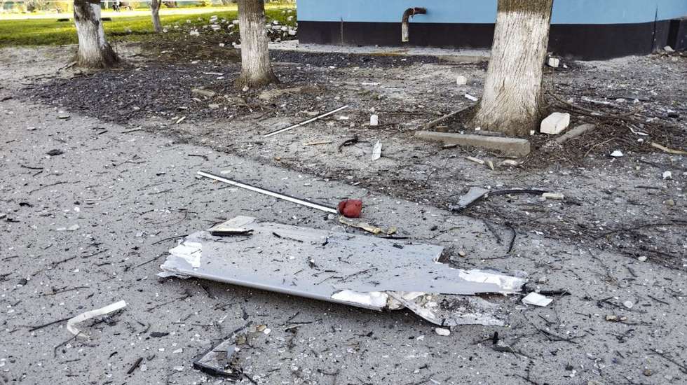 epa12032659 A handout picture made available on the Government of Kursk region official telegram channel a part of drone near a damaged apartment building following a Ukrainian drone attack in Kursk, Russia, 15 April 2025. Ukrainian drones attacked Kursk on Tuesday night, Russian authorities said. One woman was killed and nine civilians were wounded, the regional operational headquarters reported. The Russian military shot down 109 Ukrainian drones over the territory of the Kursk region on 15 April, the Russian Defense Ministry stated.  EPA/KURSK GOVERNMENT OFFICIAL TELEGRAM CHANNEL/HANDOUT HANDOUT EDITORIAL USE ONLY/NO SALES