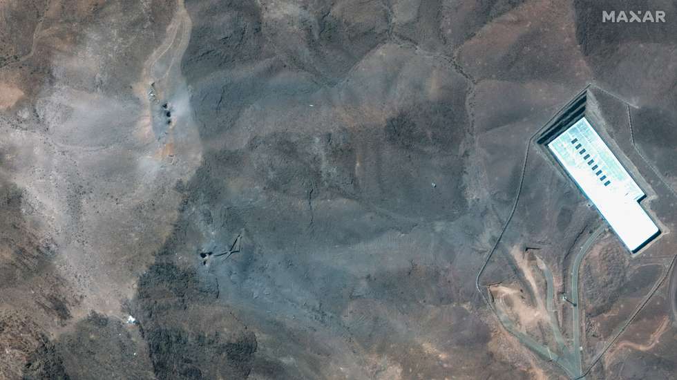 epa12190792 A handout satellite image made available by Maxar Technologies shows a closer view of craters and ash on a ridge at the Fordo underground uranium enrichment following US airstrikes, in Iran, 22 June 2025. The US forces struck three of Iran's key nuclear sites: Natanz, Isfahan and Fordo (Fordow), US President Trump announced on 21 June.  EPA/MAXAR TECHNOLOGIES HANDOUT MANDATORY CREDIT: SATELLITE IMAGE 2025 MAXAR TECHNOLOGIES -- THE WATERMARK MAY NOT BE REMOVED/CROPPEDHANDOUT EDITORIAL USE ONLY/NO SALES