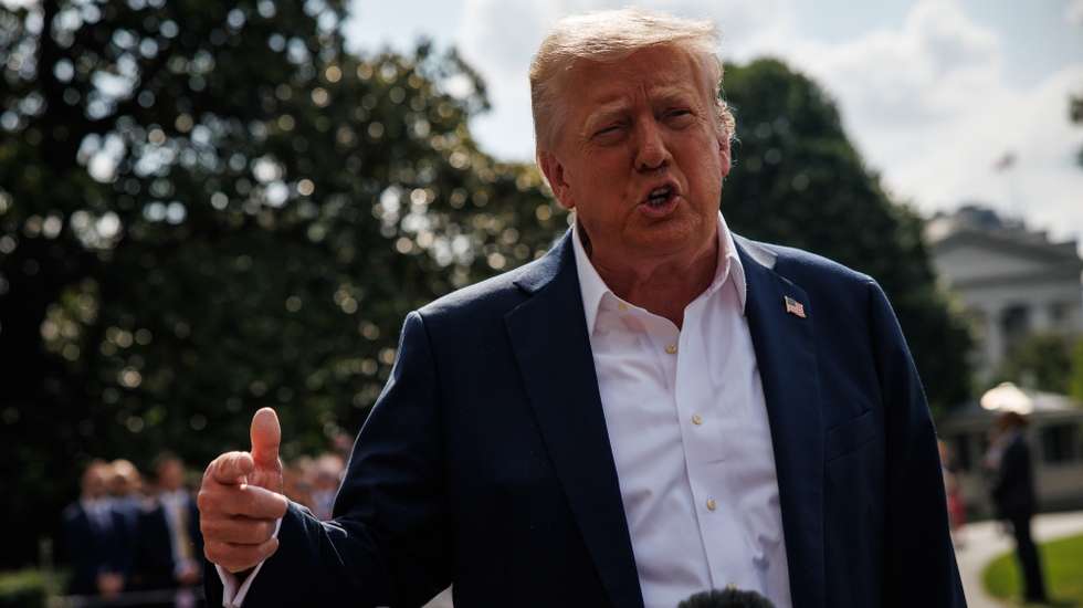 epa12232055 US President Donald Trump responds to questions from reporters after walking out of the South Portico of the White House to board Marine One on the South Lawn, in Washington, DC, USA, 11 July 2025. President Trump and First Lady are heading to Kerrville, Texas, to meet with local officials and first responders after a deadly flash flood a week ago killed at least 120 people with at least 160 people still missing.  EPA/SAMUEL CORUM / POOL