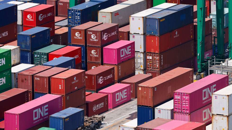 epaselect epa12287710 Shipping containers are being moved at the port in Keelung City, Taiwan, 07 August 2025. On 06 August, U.S. President Donald Trump announced that the United States intends to impose a tariff of approximately 100 percent on imported semiconductor chips, with exemptions for companies that are building or have committed to building manufacturing facilities in the United States. Taiwan, as the home of the world-leading chipmaker Taiwan Semiconductor Manufacturing Co. (TSMC), is a significant player in the global supply chain for semiconductors, which are essential for products ranging from smartphones and cars to military equipment.  EPA/RITCHIE B. TONGO