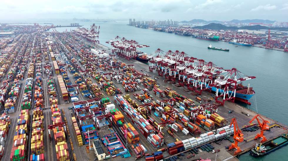 epa12450447 An aerial drone photo shows a view of the container terminal for foreign trade at Qingdao Port in Qingdao, east China's Shandong Province, 13 October 2025. China's total goods imports and exports in yuan-denominated terms rose to 33.61 trillion yuan (about 4.73 trillion U.S. dollars) in the first nine months of 2025, up 4 percent year on year, official data showed 13 October 2025.  EPA/XINHUA / YU FANGPING CHINA OUT / UK AND IRELAND OUT  /       MANDATORY CREDIT EDITORIAL USE ONLY