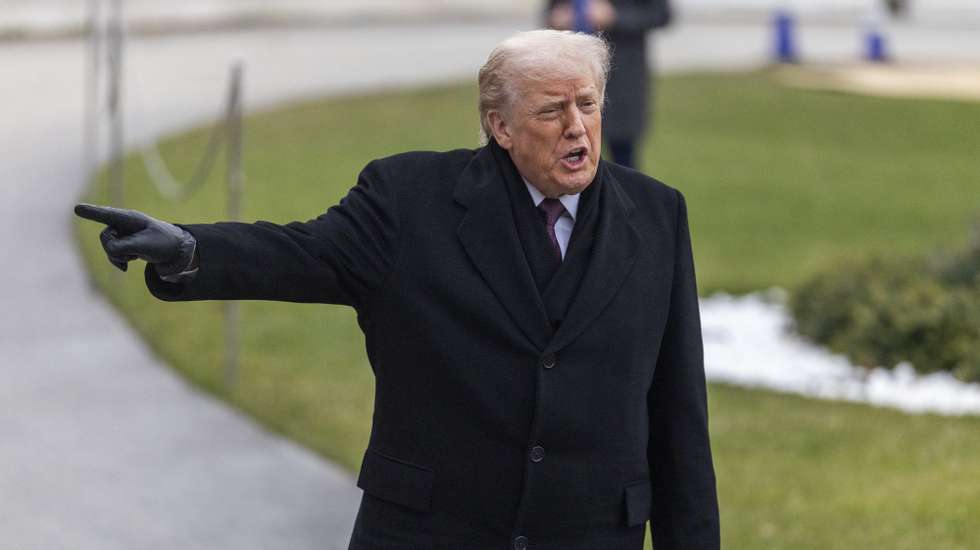 epa12599637 US President Donald J. Trump comments to the news media after stepping off Marine One on the South Lawn of the White House in Washington, DC, USA, 17 December 2025. President Trump traveled to Dover, Delaware to participate in a Dignified Transfer Ceremony as the remains of US troops return to the US.  EPA/SHAWN THEW