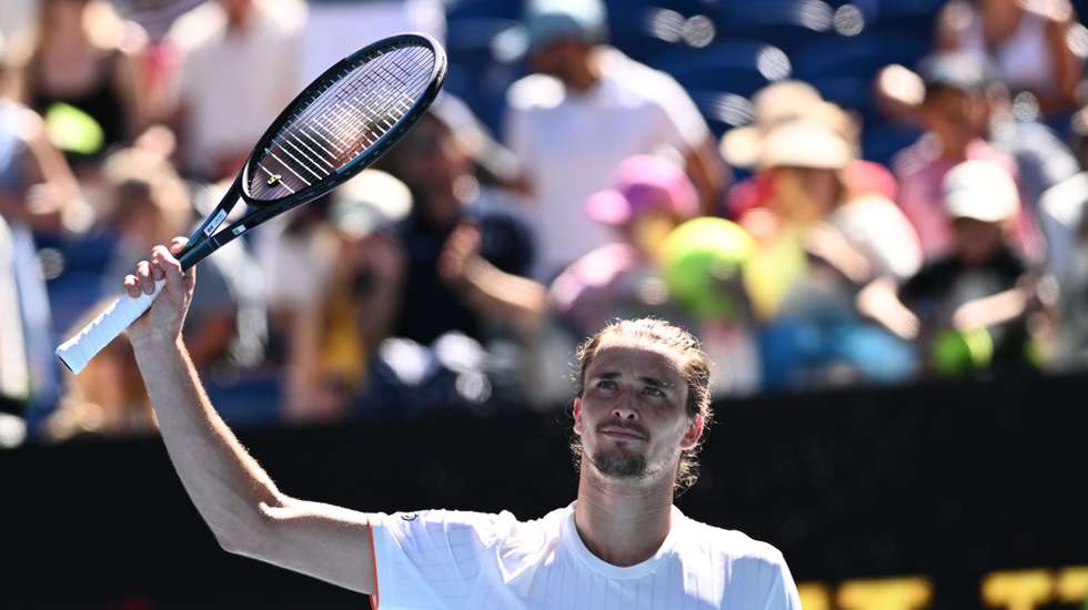 epa12657849 Alexander Zverev of Germany celebrates after winning the Men’s 1st round match against Gabriel Diallo of Canada on day 1 of the 2026 Australian Open tennis tournament at Melbourne Park in Melbourne, Sunday, January 18, 2026.  EPA/JOEL CARRETT AUSTRALIA AND NEW ZEALAND OUT