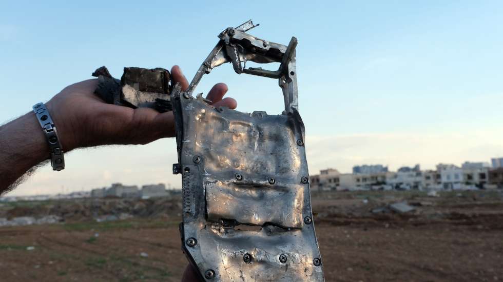 epa12783873 A man shows the remnants of Iranian shrapnel and drones following an Iranian drone attack on Erbil, Iraq, 28 February 2026. Several drones were shot down over Erbil on 28 February, after Iran reportedly launched retaliatory aerial attacks targeting US military positions in the region, including areas near the American consulate and Erbil International Airport. A joint Israeli and US military operation targeted multiple locations across Iran in the early hours of 28 February 2026.  EPA/GAILAN HAJI