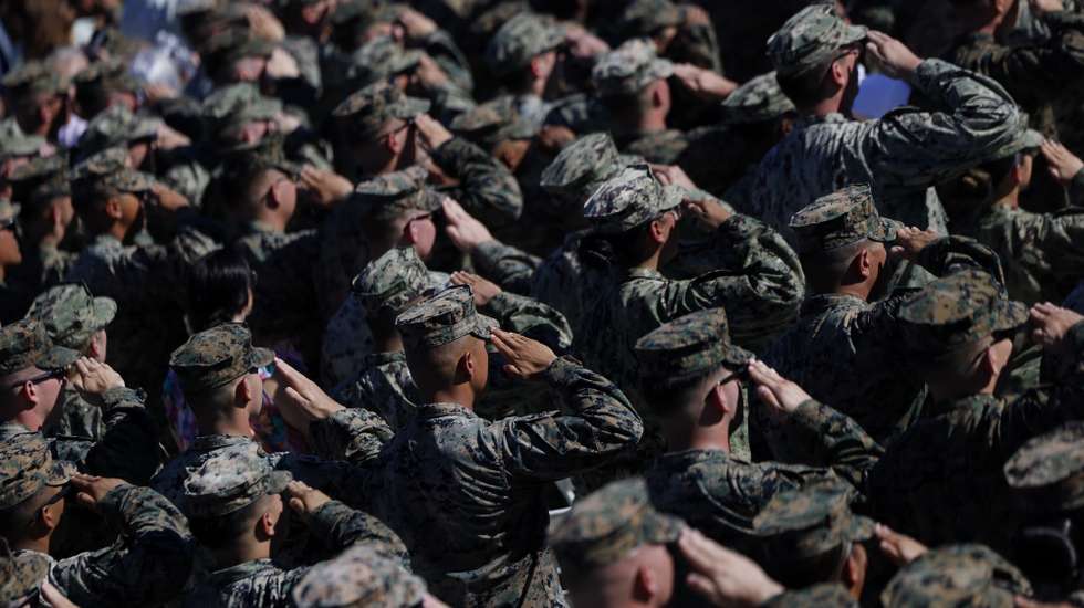 epa12463604 US Marines salute during the 'America's Marines 250: From Sea to Shore-A Review of Amphibious Strength' event, part of the celebrations marking the U.S. Marine Corps 250th anniversary at Camp Pendleton in Oceanside, California, USA, 18 October 2025.  EPA/CAROLINE BREHMAN