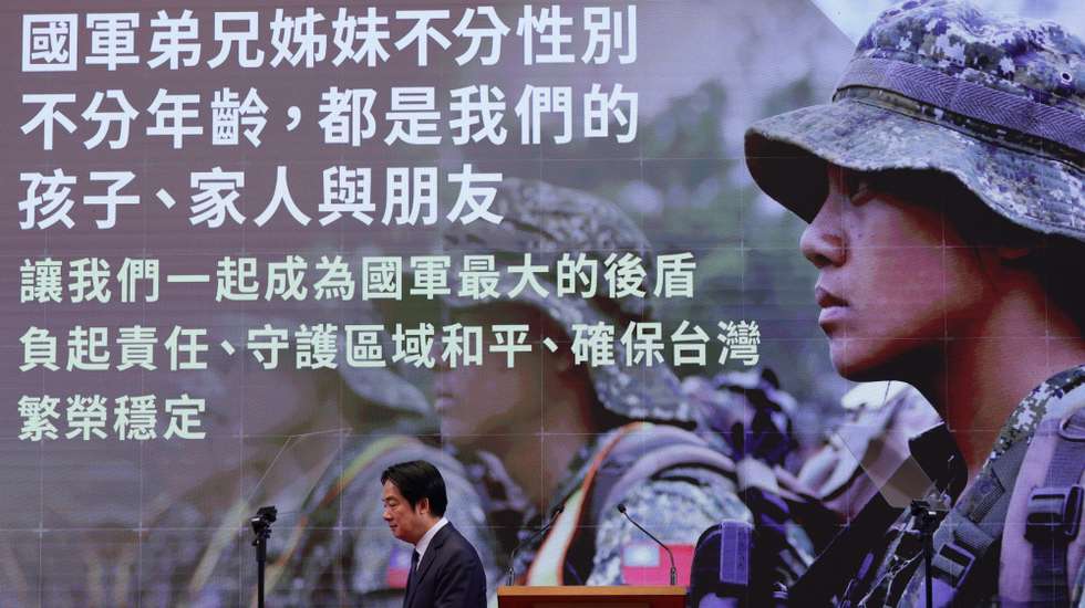 epa12725768 Taiwanese President Lai Ching-te walks during a press conference in Taipei, Taiwan, 11 February 2026. Lai spoke at a press conference titled 'National Security Cannot Wait! Support for Special Regulations on Defense Procurement', addressing national security concerns, US arms purchases and urging passage of a defense bill in Taiwan's legislature.  EPA/RITCHIE B. TONGO