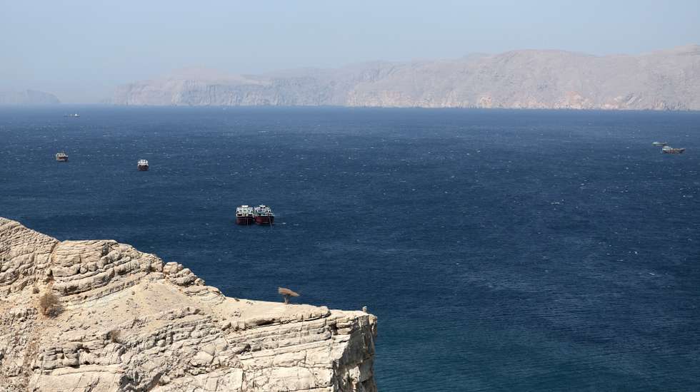 epa12194513 Ships in the Strait of Hormuz as seen from Khasab, Musandam Governorate, Oman, 24 June 2025. The Iranian parliament approved a measure to close the Strait of Hormuz following US strikes on three of Iran's key nuclear sites on 22 June 2025. Israel and Iran have been exchanging fire since Israel launched strikes across Iran on 13 June 2025.  EPA/ALI HAIDER