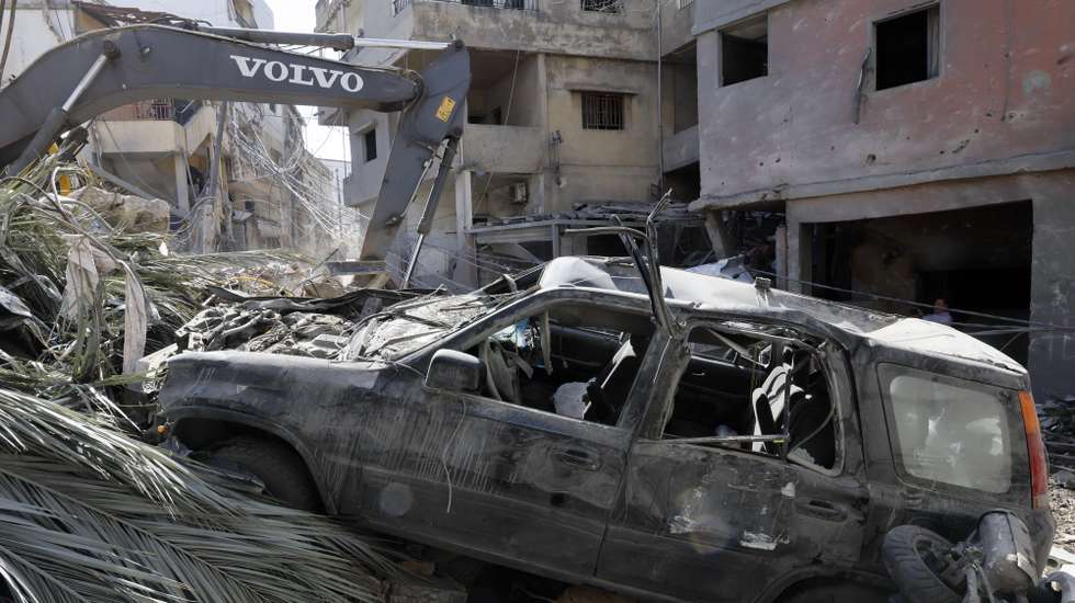 epa12871278 A bulldozer clears the rubble of destroyed buildings following an Israeli trike near the Rafik Hariri University Hospital (RHUH), in the Jnah District of Beirut, Lebanon, 06 April 2026. At least 04 people were killed and more than 35 others injured after an Israeli airstrike hit near Lebanon's largest public hospital in southern Beirut, the Lebanese Ministry of Health said. According to the Lebanese Ministry of Public Health, at least 1,470 people have been killed and more than 4,460 others injured in Israeli airstrikes across Beirut's southern suburbs and villages in southern Lebanon since the start of renewed hostilities.  EPA/WAEL HAMZEH
