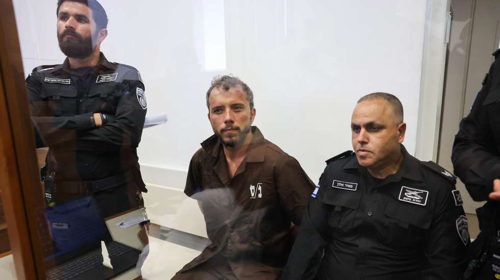 epa12929418 Thiago Avila (C), a member of the Global Sumud Flotilla, arrives to attend his trial for a remand extension at the Ashkelon Magistrate's Court in Ashkelon, Israel, 03 May 2026. Thiago Avila along with Abu Keshek were arrested on 02 May off the island of Crete, according to the organization. According to the Israeli Ministry of Foreign Affairs, Abu Keshek is suspected of affiliation with a terrorist organization, and Avila of illegal activity.  EPA/ABIR SULTAN