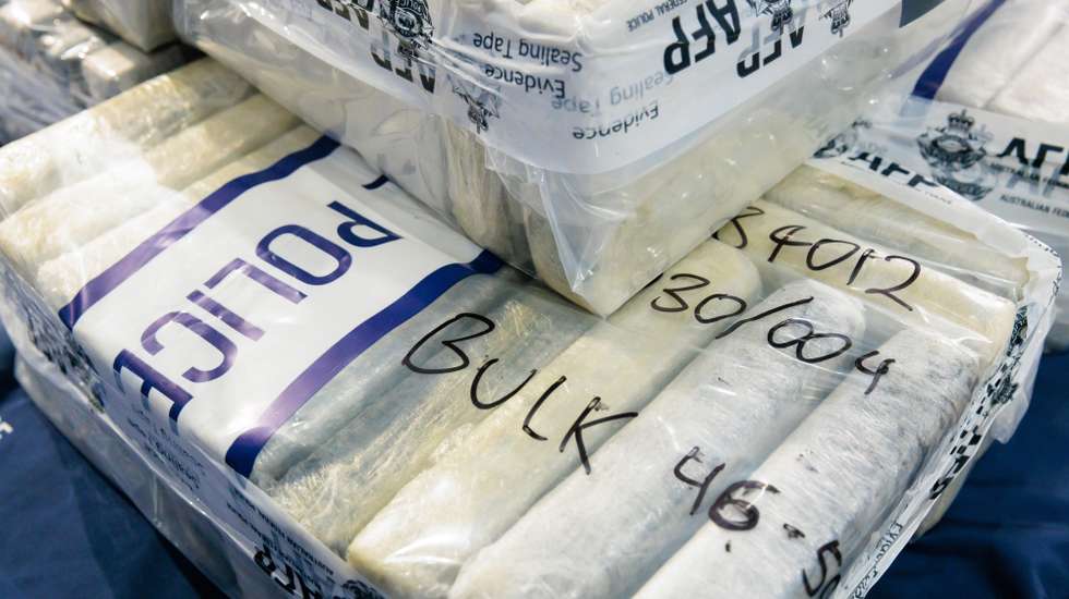 epa10668134 Recently seized cocaine displayed before a press conference at the Australian Federal Police (AFP) office in Perth, Western Australia, Australia, 02 June 2023. A joint operation between the Australian Federal Police, Australian Border Force and the Western Australia Police Force seized more than 800kg of cocaine and arrested three men allegedly connected to the plot.  EPA/RICHARD WAINWRIGHT AUSTRALIA AND NEW ZEALAND OUT