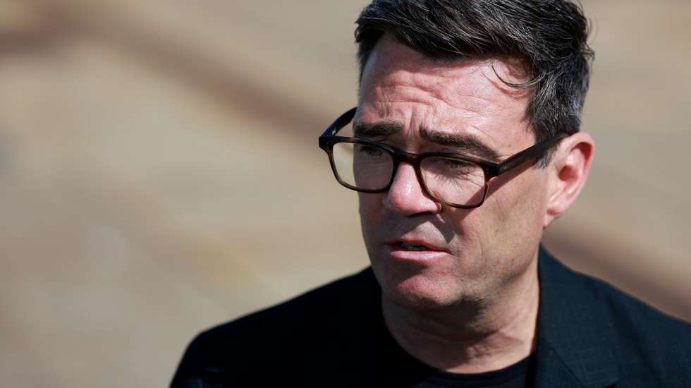 epa13136028 British Prime Minister Andy Burnham looks on during a visit to HM Naval Base with Ukraine's President Volodymyr Zelensky in Portsmouth, Britain, 27 July 2026. 'The key priorities are air defense, maritime security, and joint defense production', Zelenskyy said in a social media post on his arrival to Portsmouth.  EPA/JASON ALDEN / POOL