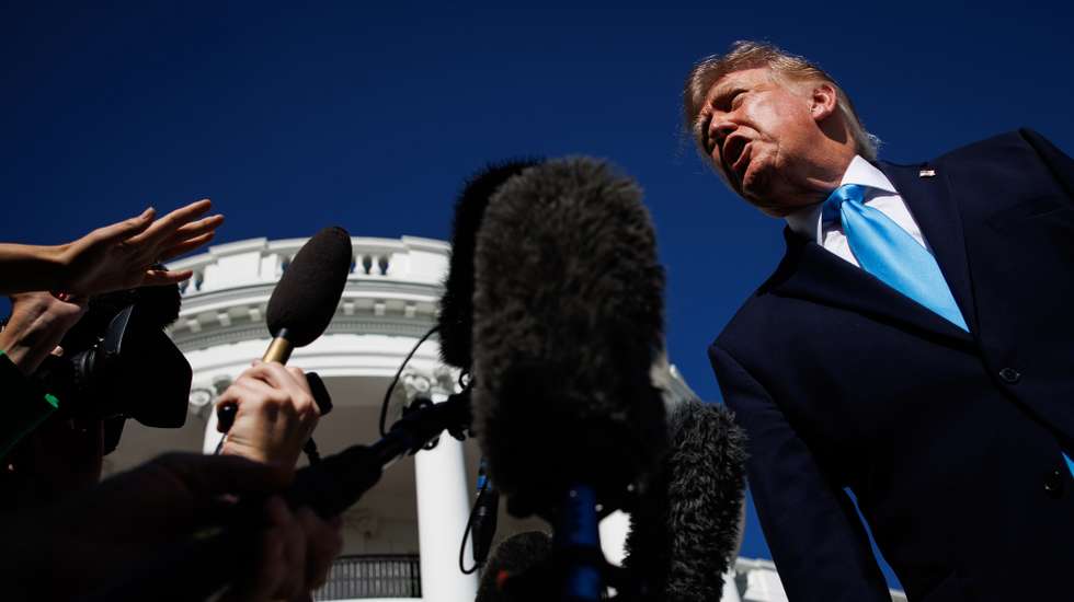 epa13283667 US President Donald Trump speaks to reporters on the South Lawn before departing the White House in Marine One in Washington, DC, USA, 05 October 2026. President Trump will deliver remarks at a midterm election rally at the Pinnacle Bank Expo Center in Grand Island, Nebraska, campaigning in support of Republican US Senator Pete Ricketts, who faces independent challenger Dan Osborn in the November midterm elections.  EPA/SAMUEL CORUM / POOL