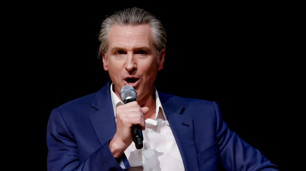 epa12770672 Democratic California Governor Gavin Newsom during his 'Young Man in a Hurry: A Memoir of Discovery' book tour stop in Atlanta, Georgia, USA, 22 February 2026. The autobiographical book will be released 24 February 2026.  EPA/ERIK S. LESSER