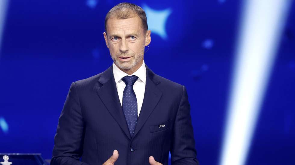 epa13194825 UEFA president Aleksander Ceferin addresses the audience at the start of the 2026/27 UEFA Champions League league phase draw at the Grimaldi Forum in Monaco, 27 August 2026.  EPA/SEBASTIEN NOGIER