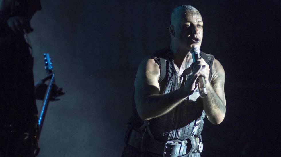 epa06074671 German singer Till Lindemann of the industrial metal band Rammstein perfoms on stage during their concert at the Resurrection Fest music festival in Viveiro, Galicia, northern Spain, 07 July 2017. The festival runs from 05 to 08 July.  EPA/ELISEO TRIGO