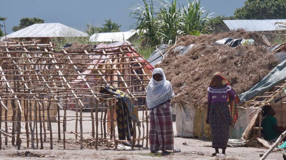 epa09110186 A handout photo made available by the World Food Programme (WFP) shows two women walking in a temporary settlement center in Palma, Cabo Delgado Province, Northern Mozambique 18 March 2021. (issued 01 April 2021) The humanitarian crisis in Cabo Delgado Province, Northern Mozambique, was caused by more than 300 armed attacks since the first attacks 2017. The violence has resulted in widespread displacement, loss of lives and casualties, massive destruction of infrastructure and disruption of humanitarian assistance to the most vulnerable people in central and northern districts of Cabo Delgado. The food security situation in Cabo Delgado is highly fragile, mostly attributed to the escalation of violence and insecurity that deprives households of access to productive assets and livelihood activities, and results in crop abandonment during harvest.  More than 900,000 people in Cabo Delgado, Niassa and Nampula are now facing Crisis or Emergency levels of food insecurity (IPC Phase 3 and 4) (HRP 2021). High levels of hunger are driven by insecurity and compounded by climatic shocks, which have disrupted agriculture and livelihoods. With limited supplies reaching markets, the cost of food and household items has skyrocketed. Cabo Delgado has the second highest rate of chronic malnutrition in Mozambique (53 percent compared to the national average of 43 percent) and any shock could rapidly deteriorate the nutritional situation.  Without urgent and sustained assistance, already desperate communities will be pushed further into crisis. The ongoing attacks have displaced 680 thousand people as of March 2021, including internally displaced persons (IDPs) seeking refuge in Nampula and Niassa provinces. WFP fears the situation may be worse in inaccessible areas, such as Mocimboa da Praia (MdP), Macomia, Muidumbe and Quissanga where more than 35,000 people may be trapped due to the  areas being unsafe and limited law enforcement.  EPA/WFP/Grant Lee Neuenburg HAND
