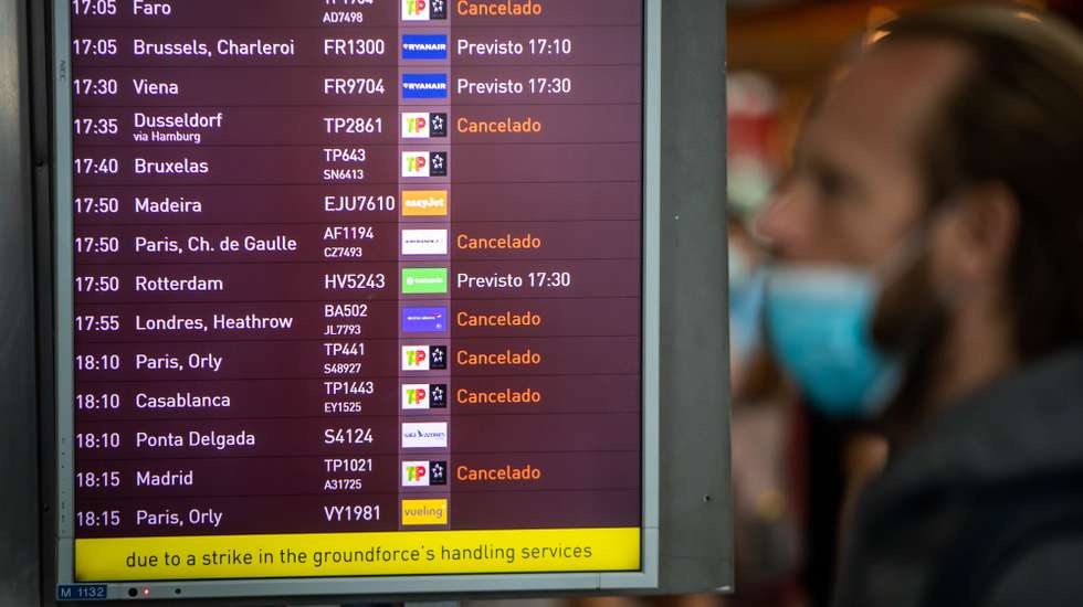 A man looks to a monitor with incoming flights to Lisbon, many of them canceled due to a strike of the handling company, Groundforce, which is causing major disruption in the Lisbon Airport, causing the cancelation of dozens of flights, in Lisbon, Portugal, 17 July 2021. Groundforce workers are protesting against colective dismissal of workers and low salaries. JOSE SENA GOULAO/LUSA