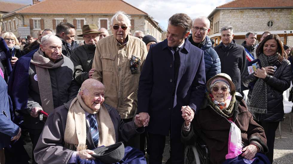 epa11282327 French President Emmanuel Macron meets Alphonse Taravello (L), 98, a resistance fighter, and Yvonne Cheval , 99, who lost part of her family during WWII, in Vassieux-en-Vercors, central France, 16 April 2024. The French president is in the region to pay homage to the local Resistance during WWII as part of the 80th anniversary of the liberation of Nazi occupied France.  EPA/Laurent Cipriani / POOL  MAXPPP OUT