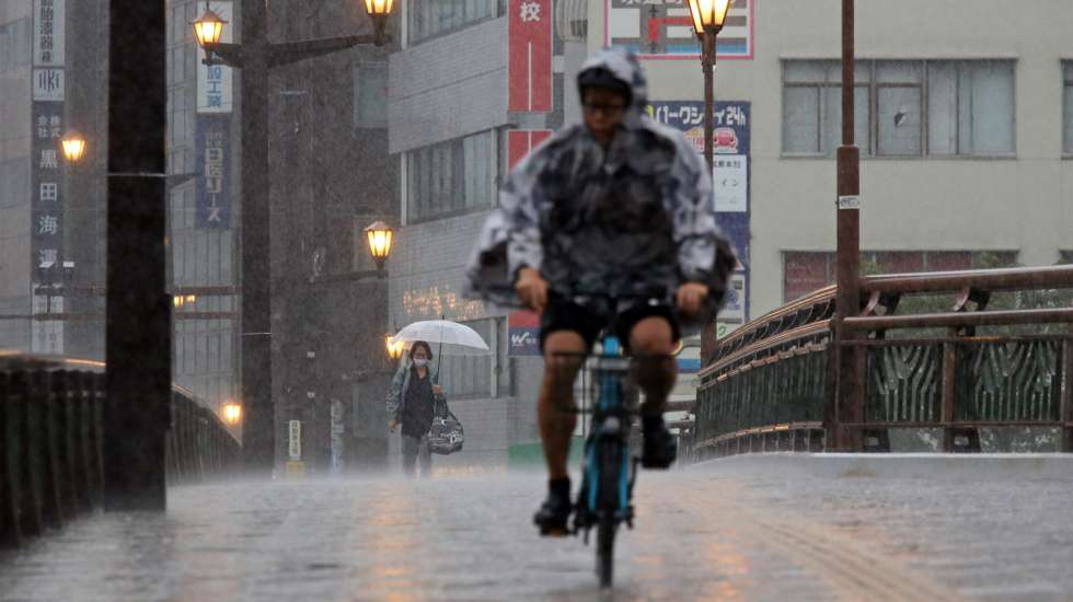 epa12293091 Heavy rain falls in Kumamoto, southwestern Japan, 11 August 2025. Kyushu island was hit by continuous heavy rainfall due to a stagnant front, causin the Japan Meteorological Agency issued a special heavy rainfall warning in the Kumamoto Prefecture area. Torrential rain triggered floods, landslides and the cancellation of bullet train services in western and southwestern Japan.  EPA/JIJI PRESS JAPAN OUT EDITORIAL USE ONLY/