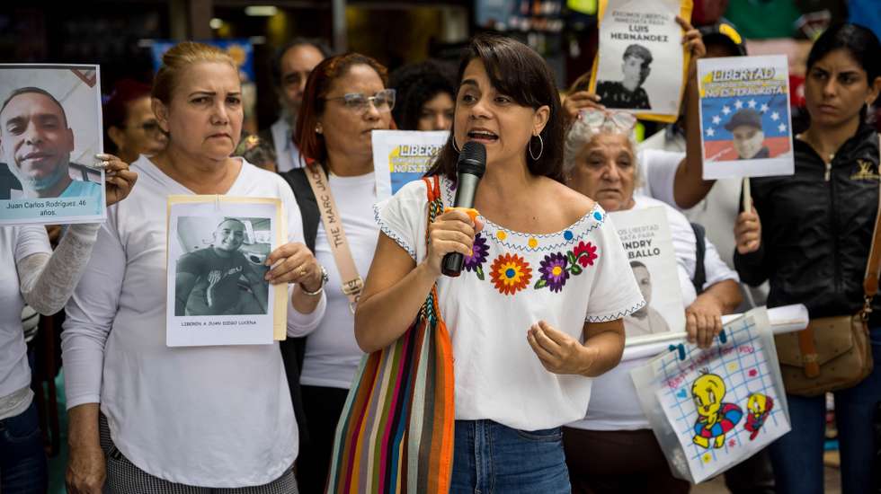 epa12170530 Martha Lia Grajales (C), speaks as Members of the Madres en Defensa de la Verdad movement (Mothers in Defense of the Truth) protest near the Palace of Justice in Caracas, Venezuela, 11 June 2025. Relatives of people detained following Venezuelaâ€™s elections asked for their release.  EPA/MIGUEL GUTIERREZ