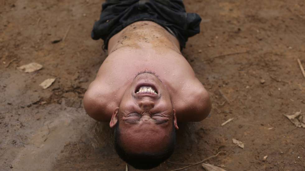 epaselect epa12258292 A new cadet member of the People's Defence Force (PDF) practices the military exercise during the basic military training at a secret jungle camp in Mon State, Myanmar, 12 July 2025 (issued 24 July 2025). The new cadets are being trained by senior members of the People's Defence Force (PDF) who have previously completed the Special Operations Forces program. The basic military training includes physical conditioning, weapons handling, basic combat medical care, and political and ethical education aimed at shaping them into disciplined and principled soldiers. Members of the PDF have been resisting Myanmar’s military junta since the coup on 1 February 2021.  EPA/KAUNG ZAW HEIN