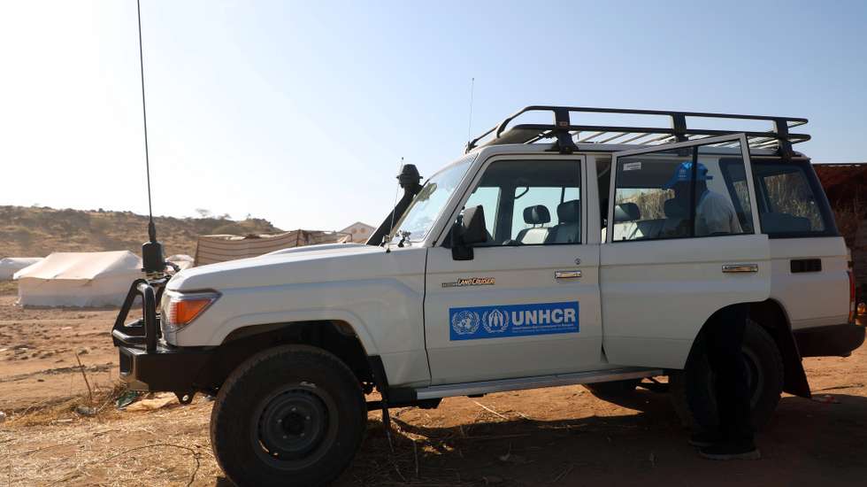 epa08849889 One of the United Nations High Commissioner for Refugees (UNHCR) cars at Um Rakuba refugee camp in the state of al-Qadarif (also known as Gedaref), Sudan, 28 November 2020. The number of refugees in this camp reached nearly 10,000 refugees who crossed the border from Ethiopia to Sudan to escape the conflict in Tigray region of Ethiopia.  EPA/MOHAMMED ABU OBAID