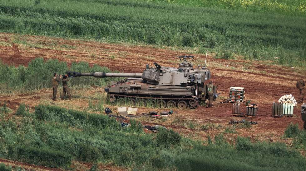 epa12856921 An Israeli artillery unit deployed on the Israel-Lebanon border, northern Israel, 28 March 2026. Israel resumed operations in Lebanon in early March 2026, targeting Hezbollah's infrastructure and personnel.  EPA/ATEF SAFADI